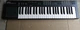 Yamaha Portatone PSR-11 Electronic Keyboard with Synthesizer Buttons